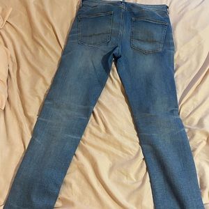 Light blue skinny jeans.